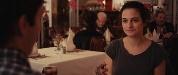 Movie still from “Obvious Child” (2014), directed by Gillian Robespierre – A woman sitting at a table in front of a glass of water; Close Up shot, Over the shoulder angle