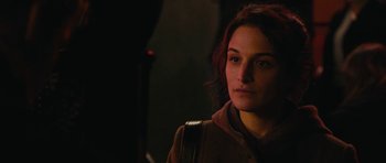 Movie still from “Obvious Child” (2014), directed by Gillian Robespierre – A person wearing a brown jacket; Close Up shot, Over the shoulder angle