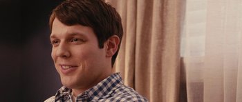 Movie still from “Obvious Child” (2014), directed by Gillian Robespierre – A person wearing a checkered shirt; Close Up shot, Over the shoulder angle