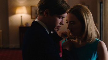 Movie still from “On Chesil Beach” (2017), directed by Dominic Cooke – A man and a woman looking at each other; Close Up shot, Low angle