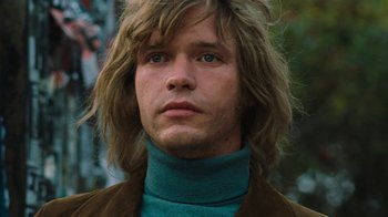 Movie still from “On Chesil Beach” (2017), directed by Dominic Cooke – A person with long hair; Close Up shot, Low angle