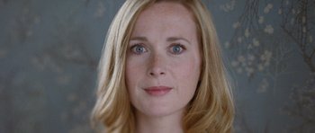 Movie still from “Mr. Nobody” (2009), directed by Jaco Van Dormael – A woman's face with blue eyes; Close Up shot, Low angle