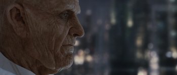 Movie still from “Mr. Nobody” (2009), directed by Jaco Van Dormael – An old man with a wrinkled face looking off into the distance; Close Up shot, Over the shoulder angle