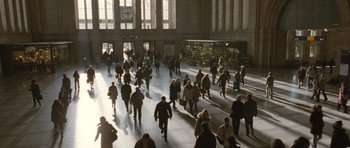 Movie still from “Mr. Nobody” (2009), directed by Jaco Van Dormael – A large group of people walking in a building; Extreme Wide shot, High angle