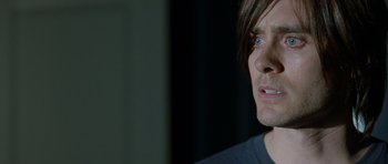 Movie still from “Mr. Nobody” (2009), directed by Jaco Van Dormael – A person with long brown hair; Close Up shot, Over the shoulder angle
