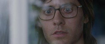 Movie still from “Mr. Nobody” (2009), directed by Jaco Van Dormael – A person wearing glasses looking at the camera; Extreme Close Up shot, High angle