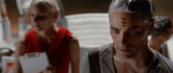 Movie still from “Mr. Nobody” (2009), directed by Jaco Van Dormael – A man and a woman are looking at the camera; Close Up shot, Over the shoulder angle