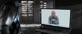 Movie still from “Mr. Nobody” (2009), directed by Jaco Van Dormael – An old man sitting in front of a television; Medium shot, Over the shoulder angle