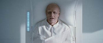 Movie still from “Mr. Nobody” (2009), directed by Jaco Van Dormael – An old man in a hospital bed wearing a white shirt; Medium shot, High angle