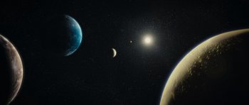 Movie still from “Mr. Nobody” (2009), directed by Jaco Van Dormael – An image of an outer space scene with planets; Extreme Wide shot, Overhead angle
