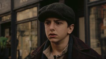 Movie still from “Once Upon a Time in America” (1984), directed by Sergio Leone – A young man wearing a hat and a jacket; Close Up shot, Low angle