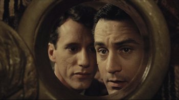 Movie still from “Once Upon a Time in America” (1984), directed by Sergio Leone – Two men looking at each other in a mirror; Close Up shot, High angle