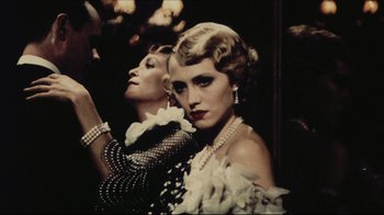 Movie still from “Once Upon a Time in America” (1984), directed by Sergio Leone – Two beautiful women dressed up for a fancy event; Close Up shot, Low angle