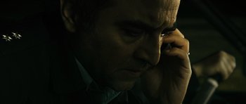 Movie still from “Once Upon a Time in Anatolia” (2011), directed by Nuri Bilge Ceylan – A person talking on a cell phone; Extreme Close Up shot, High angle