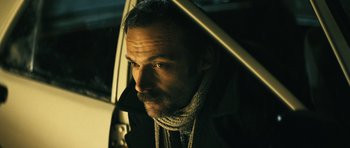 Movie still from “Once Upon a Time in Anatolia” (2011), directed by Nuri Bilge Ceylan – A person with a beard; Close Up shot, Low angle