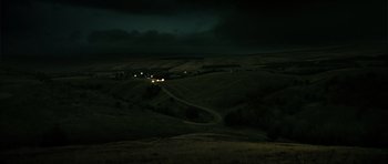 Movie still from “Once Upon a Time in Anatolia” (2011), directed by Nuri Bilge Ceylan – A view of a field at night from a hill; Extreme Wide shot, High angle