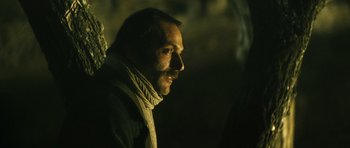 Movie still from “Once Upon a Time in Anatolia” (2011), directed by Nuri Bilge Ceylan – A person wearing a scarf; Close Up shot, Low angle