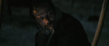 Movie still from “Once Upon a Time in Anatolia” (2011), directed by Nuri Bilge Ceylan – A person wearing a scarf; Close Up shot, Low angle
