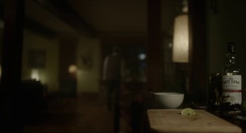 Movie still from “Orphan: First Kill” (2022), directed by William Brent Bell – A bowl of food sitting on top of a wooden table; Extreme Close Up shot, Over the shoulder angle