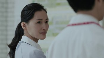 Movie still from “Our Little Sister” (2015), directed by Kore-eda Hirokazu – A woman in a white shirt is looking at a man in a white shirt; Close Up shot, Over the shoulder angle