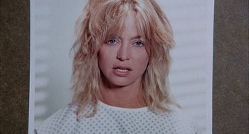 Movie still from “Overboard” (1987), directed by Garry Marshall – A person with long blonde hair; Close Up shot, Low angle