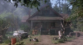 Movie still from “Overboard” (1987), directed by Garry Marshall – An old house in the middle of a forest; Extreme Wide shot, High angle