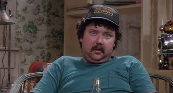 Movie still from “Overboard” (1987), directed by Garry Marshall – A person wearing a hat; Close Up shot, High angle