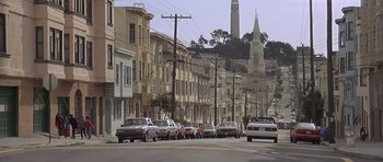 Movie still from “Mrs. Doubtfire” (1993), directed by Chris Columbus – Cars are parked on the side of the street; Extreme Wide shot, High angle