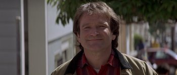 Movie still from “Mrs. Doubtfire” (1993), directed by Chris Columbus – A person wearing a jacket; Close Up shot, Low angle