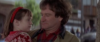 Movie still from “Mrs. Doubtfire” (1993), directed by Chris Columbus – A man and a woman looking at one another; Close Up shot, Over the shoulder angle