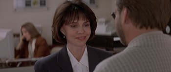 Movie still from “Mrs. Doubtfire” (1993), directed by Chris Columbus – A person talking to another person; Close Up shot, Over the shoulder angle