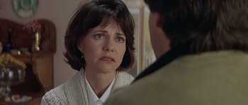 Movie still from “Mrs. Doubtfire” (1993), directed by Chris Columbus – A person talking to another person; Close Up shot, Over the shoulder angle