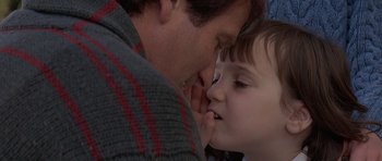 Movie still from “Mrs. Doubtfire” (1993), directed by Chris Columbus – A person and a child face to face; Close Up shot, Over the shoulder angle