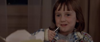 Movie still from “Mrs. Doubtfire” (1993), directed by Chris Columbus – A little girl brushing her teeth with an electric toothbrush; Close Up shot, Low angle