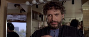 Movie still from “Mrs. Doubtfire” (1993), directed by Chris Columbus – A person with a beard; Close Up shot, Low angle