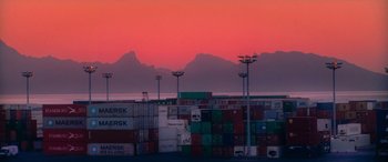 A view of a lot of containers in a harbor