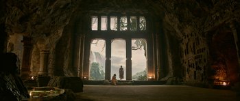 Movie still from “Padmaavat” (2018), directed by Sanjay Leela Bhansali – A man and a woman standing in front of an archway; Extreme Wide shot, Low angle