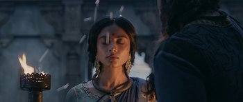 Movie still from “Padmaavat” (2018), directed by Sanjay Leela Bhansali – A young woman in indian garb with her eyes closed; Close Up shot, Low angle