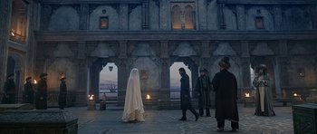 Movie still from “Padmaavat” (2018), directed by Sanjay Leela Bhansali – A group of people standing in front of a building; Wide shot, Low angle