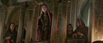 Movie still from “Padmaavat” (2018), directed by Sanjay Leela Bhansali – A woman standing next to another woman in an ornate room; Medium shot, Low angle