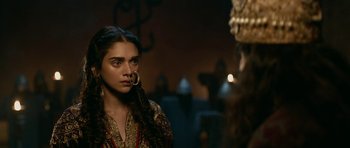 Movie still from “Padmaavat” (2018), directed by Sanjay Leela Bhansali – A woman with a nose ring looking into a mirror; Close Up shot, Over the shoulder angle