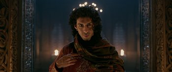 Movie still from “Padmaavat” (2018), directed by Sanjay Leela Bhansali – A man with a long curly hair and a ring around his finger; Close Up shot, Low angle