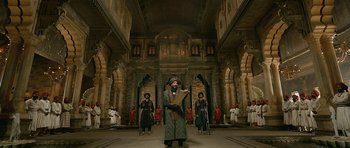 Movie still from “Padmaavat” (2018), directed by Sanjay Leela Bhansali – A group of people standing in a room; Wide shot, Low angle