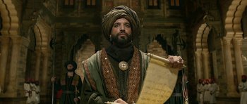 Movie still from “Padmaavat” (2018), directed by Sanjay Leela Bhansali – A man with a beard and a turban on; Medium shot, Low angle