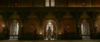 Movie still from “Padmaavat” (2018), directed by Sanjay Leela Bhansali – A group of people standing in front of an ornate doorway; Extreme Wide shot, Low angle
