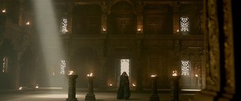 Movie still from “Padmaavat” (2018), directed by Sanjay Leela Bhansali – A man and a woman standing in front of a building; Extreme Wide shot, Low angle