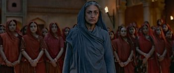 Movie still from “Padmaavat” (2018), directed by Sanjay Leela Bhansali – A group of women standing next to each other in a room; Medium shot, Low angle