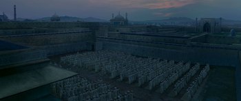 Movie still from “Padmaavat” (2018), directed by Sanjay Leela Bhansali – A group of people standing in front of a building; Extreme Wide shot, High angle