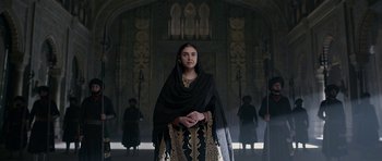 Movie still from “Padmaavat” (2018), directed by Sanjay Leela Bhansali – A woman in a black dress and a black shawl; Medium shot, Low angle