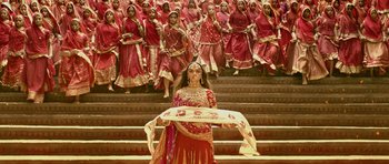 Movie still from “Padmaavat” (2018), directed by Sanjay Leela Bhansali – A group of women dressed in traditional indian garb; Wide shot, High angle